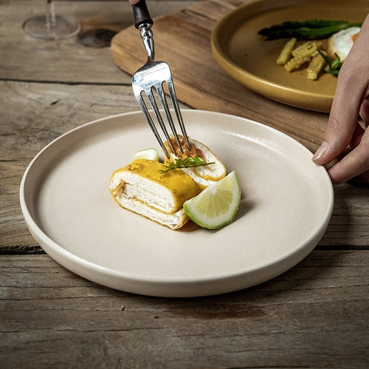 Elevate Your Dining Experience with Our Solid Color Nordic Style Ceramic Plate